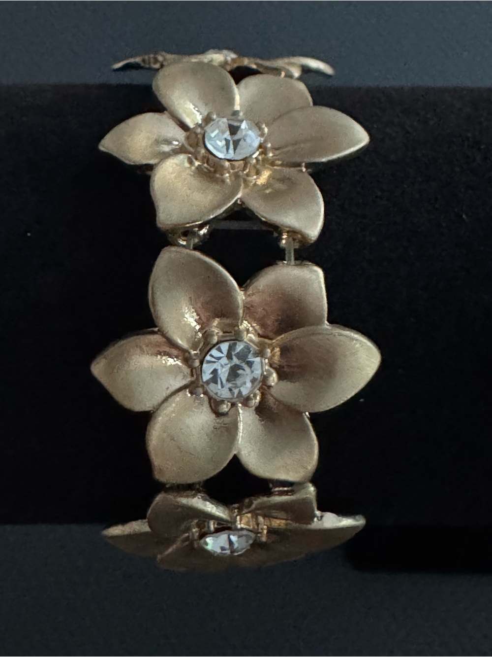 Gold Tone Floral Crystal Stretch Bracelet. Not stamped. Not magnetic.